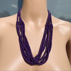 Bold purple bead and tube necklace in 24 inch.